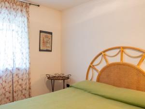 A bed or beds in a room at Villa Rimbaudo by Interhome