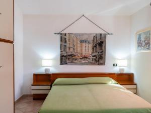 A bed or beds in a room at Villa Rimbaudo by Interhome