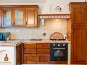 A kitchen or kitchenette at Villa Rimbaudo by Interhome