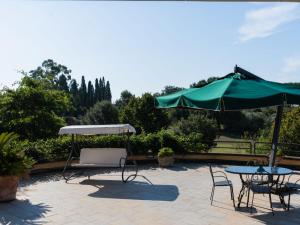 A garden outside Villa Rimbaudo by Interhome