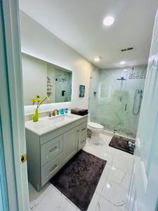 a bathroom with a sink and a shower at Cozy Bedroom Suites in Beautiful Shared Home in Matthews +34 photos