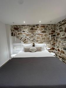 Letto o letti in una camera di "Calm Joy & J" - Lithops