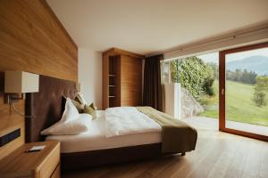 Posteľ alebo postele v izbe v ubytovaní Hotel Grien