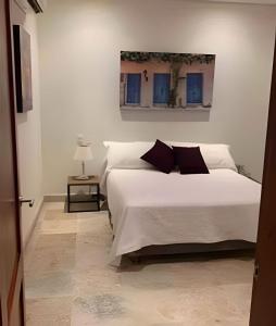 Кровать или кровати в номере 212 Cartagena Walled City Magical Apt +16 фотографий