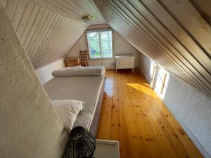 Postel nebo postele na pokoji v ubytování Kapelludden Östra Öland