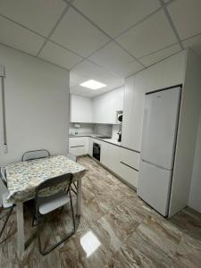 Kuchyň nebo kuchyňský kout v ubytování Casa MARISA