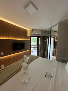 Postel nebo postele na pokoji v ubytování Jatiuca Suítes Resort FLAT