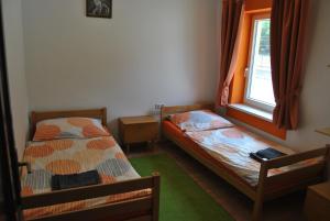 Postel nebo postele na pokoji v ubytování Ferienwohnung Rosenbach OG