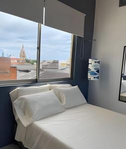 Ένα ή περισσότερα κρεβάτια σε δωμάτιο στο 417 Apto con vista panorámica de cgna