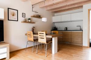 Kuchyň nebo kuchyňský kout v ubytování PavLove Apartment
