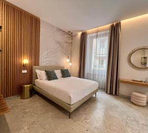 Postel nebo postele na pokoji v ubytování Elegant Rooms