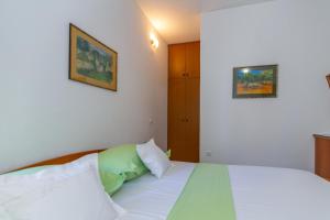 Posteľ alebo postele v izbe v ubytovaní City Center ANA Apartments