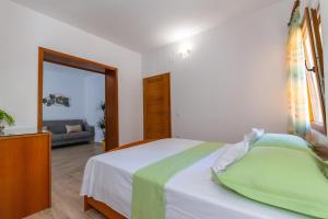 Posteľ alebo postele v izbe v ubytovaní City Center ANA Apartments