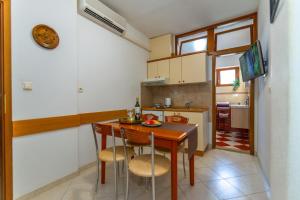 Kuchyňa alebo kuchynka v ubytovaní City Center ANA Apartments
