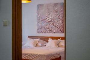 Posteľ alebo postele v izbe v ubytovaní City Center ANA Apartments