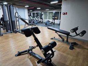 Phòng/tiện nghi tập thể dục tại Cozy Condo unit Best Location at Lacson street