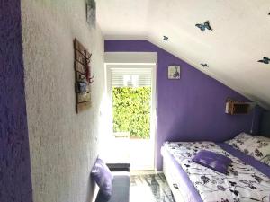 Postel nebo postele na pokoji v ubytování Apartments Biondi