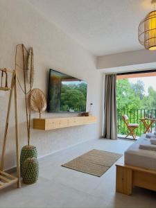 TV a/nebo společenská místnost v ubytování Rue Rooms