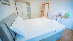 Voodi või voodid majutusasutuse Apartman PE-OS, self check-in toas