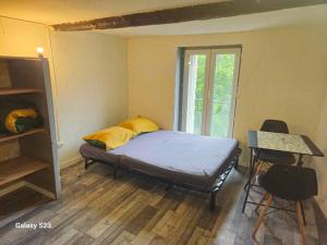 Postel nebo postele na pokoji v ubytování studio cœur de ville