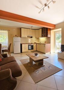 Η κουζίνα ή μικρή κουζίνα στο Apartman Petra