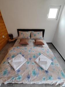Postel nebo postele na pokoji v ubytování Rural Resort Tron