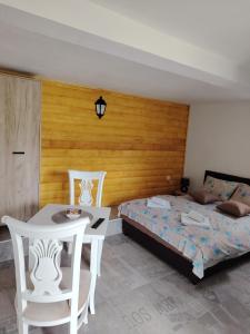 Postel nebo postele na pokoji v ubytování Rural Resort Tron