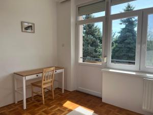 a room with a desk and a window at Jó hely in Balatonalmádi +21 photos