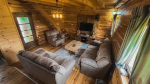 an overhead view of a living room in a log cabin at Sweet Home Zabljak in Žabljak