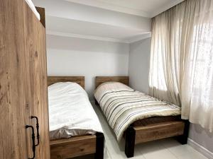 Postel nebo postele na pokoji v ubytování Villa Mjora + 18 fotografií