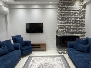 TV a/nebo společenská místnost v ubytování Villa Mjora