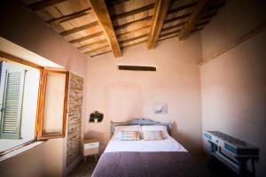 Vuode tai vuoteita majoituspaikassa Il Vicoletto di BIBI - B&B