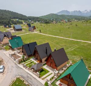 an aerial view of a village with houses at Sweet Home Zabljak in Žabljak