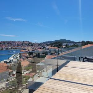 a view from the balcony of a house at Design penthouse 5 in Mali Lošinj