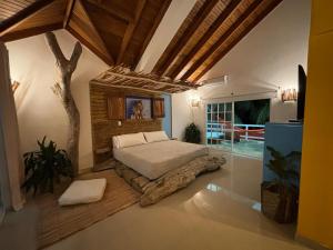 Voodi või voodid majutusasutuse Coco House by Be Happy toas