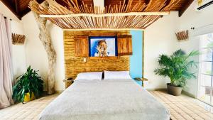Voodi või voodid majutusasutuse Coco House by Be Happy toas