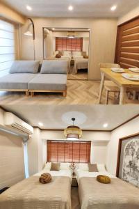 a large room with two beds and a table at 65 两室一厅 駒込站4分 近商业街 2 rooms 4 mins to ST Max 7P 直达新宿 涉谷 表参道 池袋 上野 代代木 银座 原宿 in Tokyo