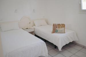 Ένα ή περισσότερα κρεβάτια σε δωμάτιο στο Acapulco Ocean View +130 φωτογραφίες
