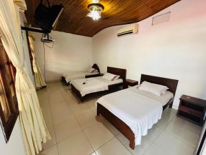 Hotel Andes客房内的一张或多张床位