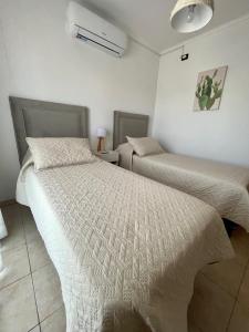 Ένα ή περισσότερα κρεβάτια σε δωμάτιο στο Amplio y luminoso departamento en complejo cerrado +10 φωτογραφίες