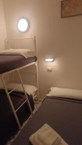A bed or beds in a room at Hotel Le Terrazze