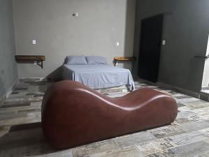 Postel nebo postele na pokoji v ubytování Auto hotel el Búho