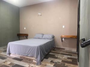 Postel nebo postele na pokoji v ubytování Auto hotel el Búho