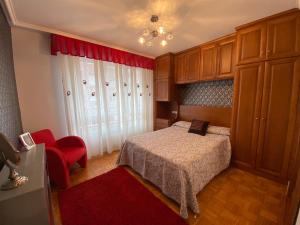 Katil atau katil-katil dalam bilik di Apartamento en Pola de Siero