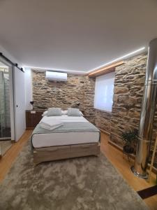 Ένα ή περισσότερα κρεβάτια σε δωμάτιο στο Apartamento - estudio OCARALLO29