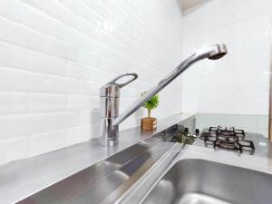 Dapur atau dapur kecil di J5-東京中心 駒込駅4分近商业街 4mins to ST Max 4P 直达新宿 渋谷 表参道 池袋 上野 代代木 銀座 原宿