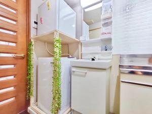 Dapur atau dapur kecil di J5-東京中心 駒込駅4分近商业街 4mins to ST Max 4P 直达新宿 渋谷 表参道 池袋 上野 代代木 銀座 原宿