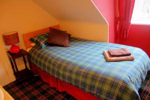 Postel nebo postele na pokoji v ubytování Atticus Central Guest House + 10 fotografií