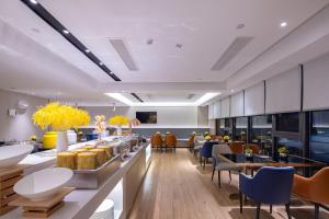 Foto Wenshanis asuva majutusasutuse Echarm Hotel Wenshan galeriist +20 fotot
