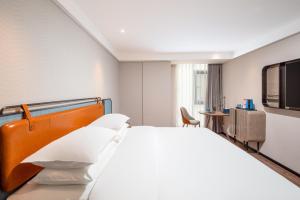 Foto Wenshanis asuva majutusasutuse Echarm Hotel Wenshan galeriist